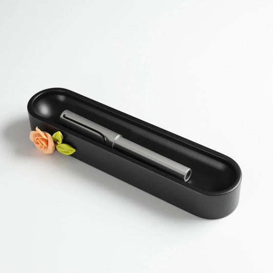 Black Oval Pen Tray with a Flower