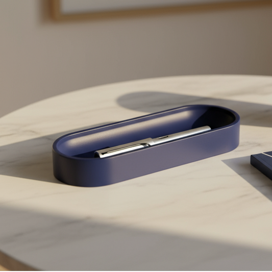 Blue pen holder with a pen on a light wooden surface